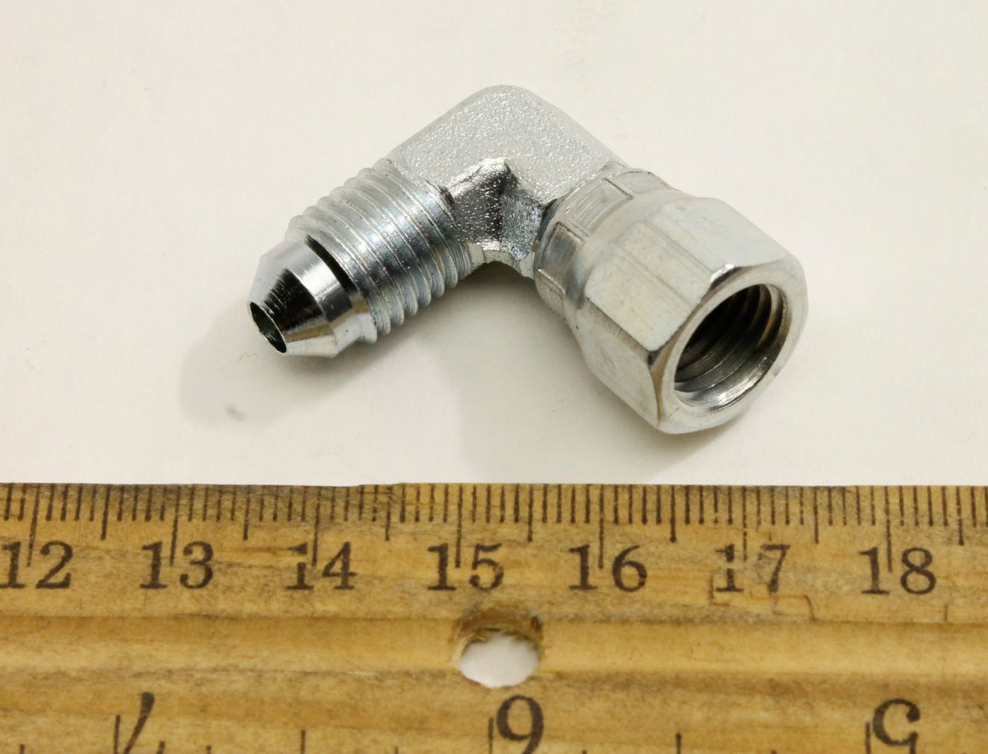 Genie Part # 87246GT – Elbow, Swivel Nut 90Deg